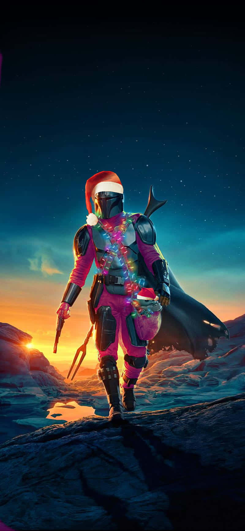 The Mandalorian iPhone 桌布 壁紙 — 一位身穿節日粉紅色盔甲和聖誕帽的曼達洛戰士在星空下日落時分走在岩石懸崖頂上。