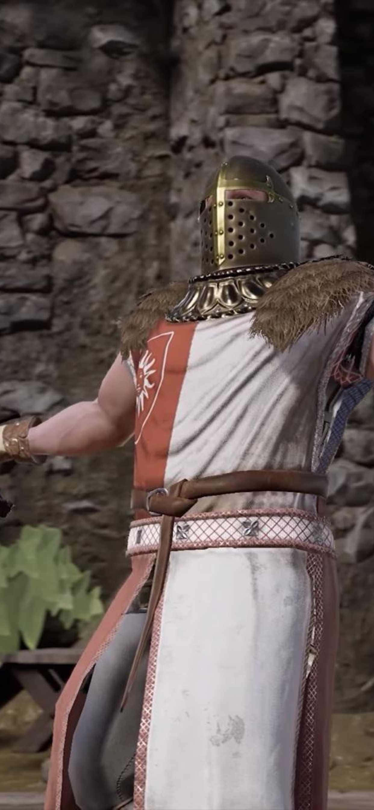 iPhone Xs Max Mordhau 桌布 壁紙 — 一位身穿精細盔甲的中世紀騎士站在石牆前，肩部飾有毛皮，頭盔帶有眼縫。