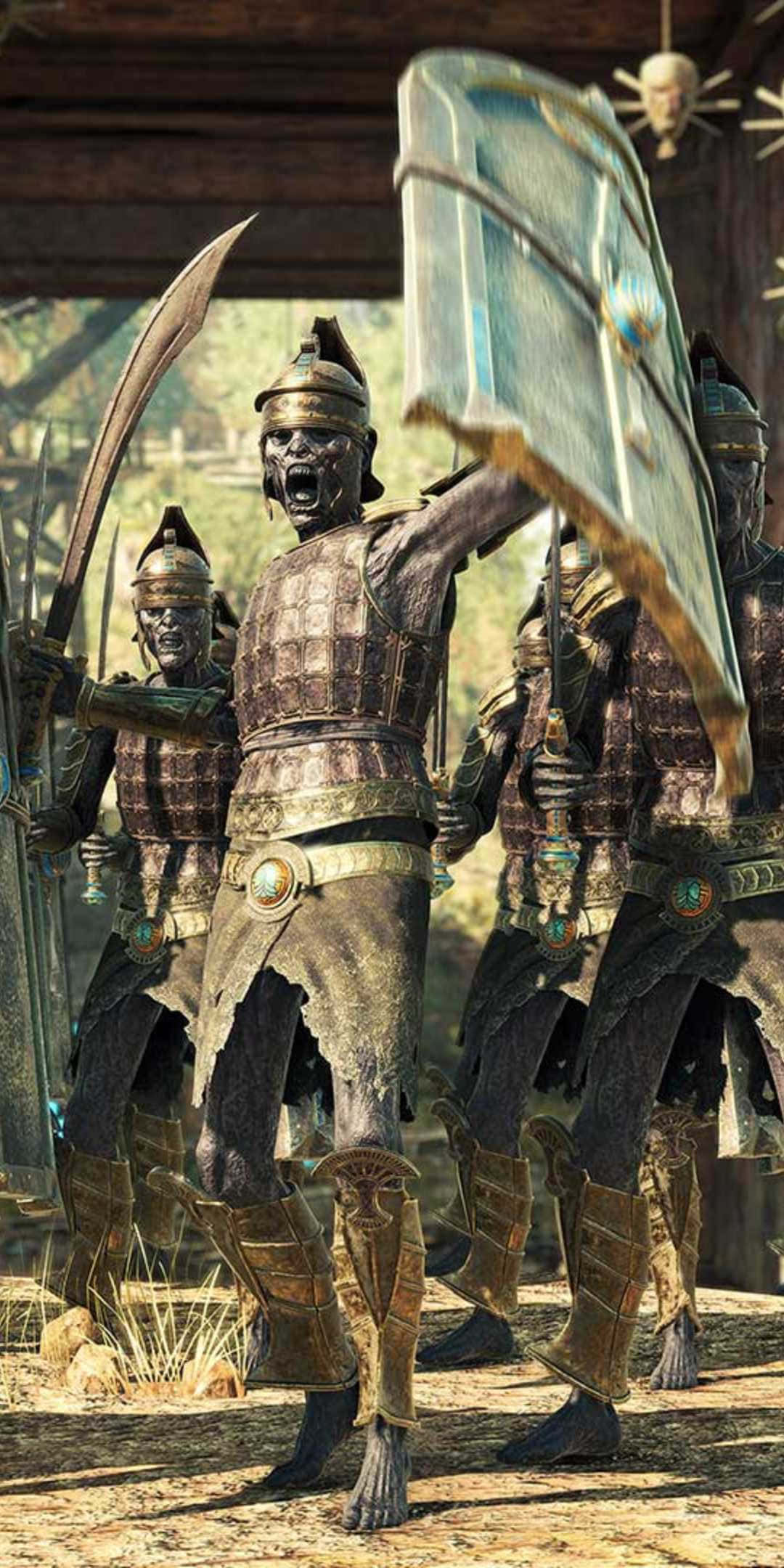Pixel 3 Strange Brigade 桌布 壁紙 — 一位身穿精細青銅盔甲的兇猛古代戰士，在陽光照射的木結構中與同伴一起揮舞彎曲的劍和巨大的盾牌，發出怒吼。