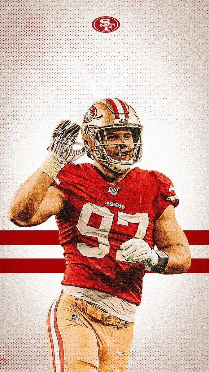 足球 桌布 壁紙 — 一位身穿紅色97號球衣的舊金山49人美式足球員，在帶有球隊標誌的點狀背景上向球迷揮手。
