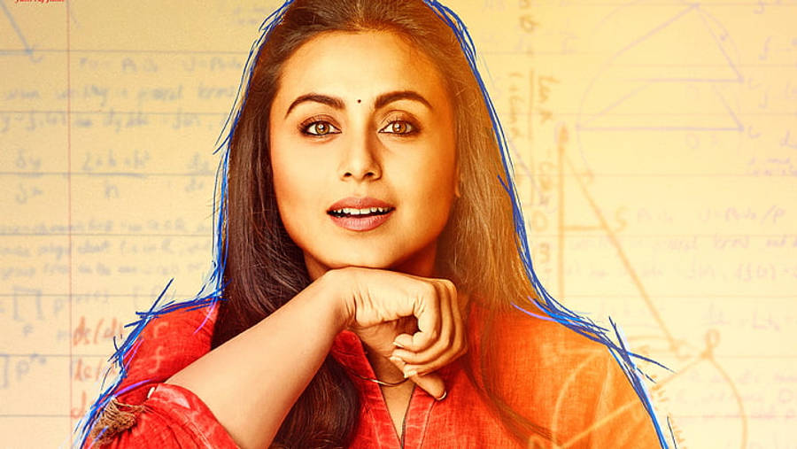 Rani Mukerji 桌布 壁紙 — 一位身穿紅色襯衫的女性，在充滿數學方程式和藍色草圖線條的黃色背景前，將下巴擱在手上。