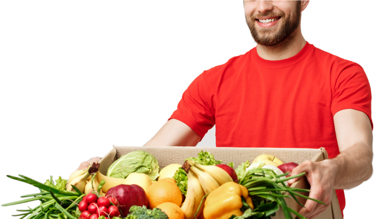 Fruit 桌布 壁紙 — 一位身穿紅襯衫、面帶微笑的男子自豪地捧著一個裝滿色彩繽紛新鮮蔬果的紙箱。