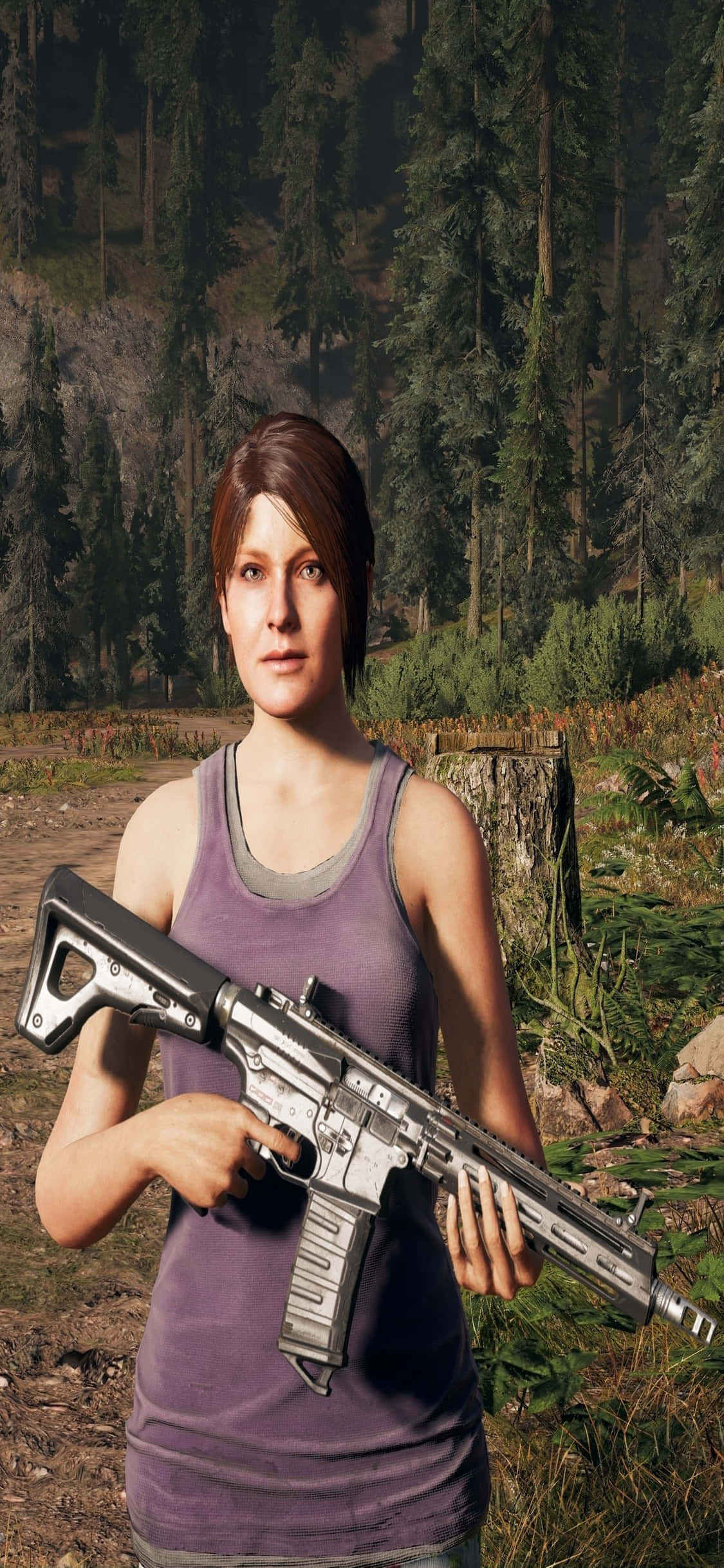 iPhone Xs Far Cry 5 桌布 壁紙 — 一位身穿紫色背心的女性在陽光明媚的森林空地中持步槍，身後有高大的松樹和樹樁。