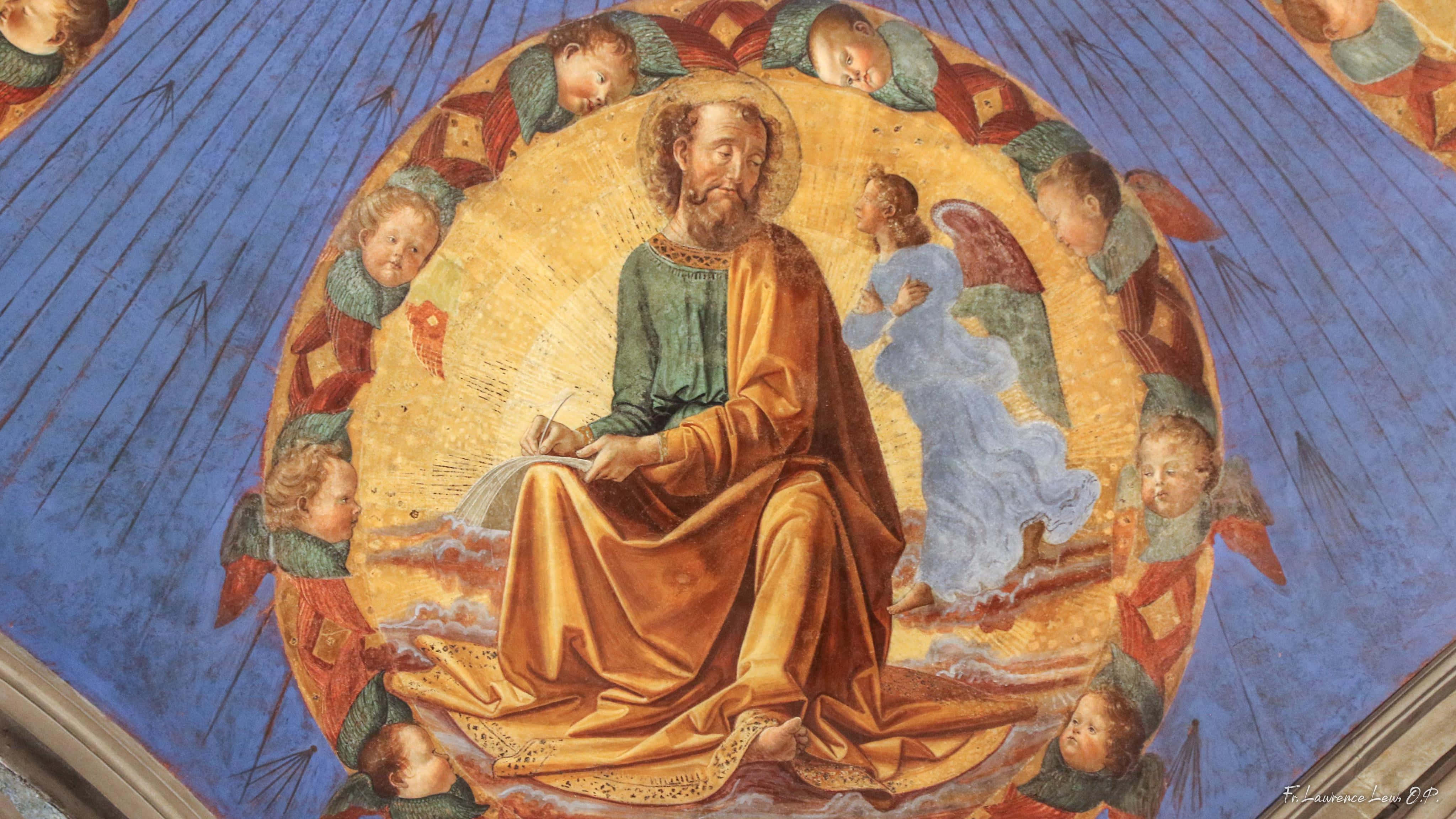 Catholic Desktop 桌布 壁紙 — 一位身穿綠色長袍、頭戴金色光環的聖人坐在寶座上，周圍有天使圍繞，背景是藍色光芒。
