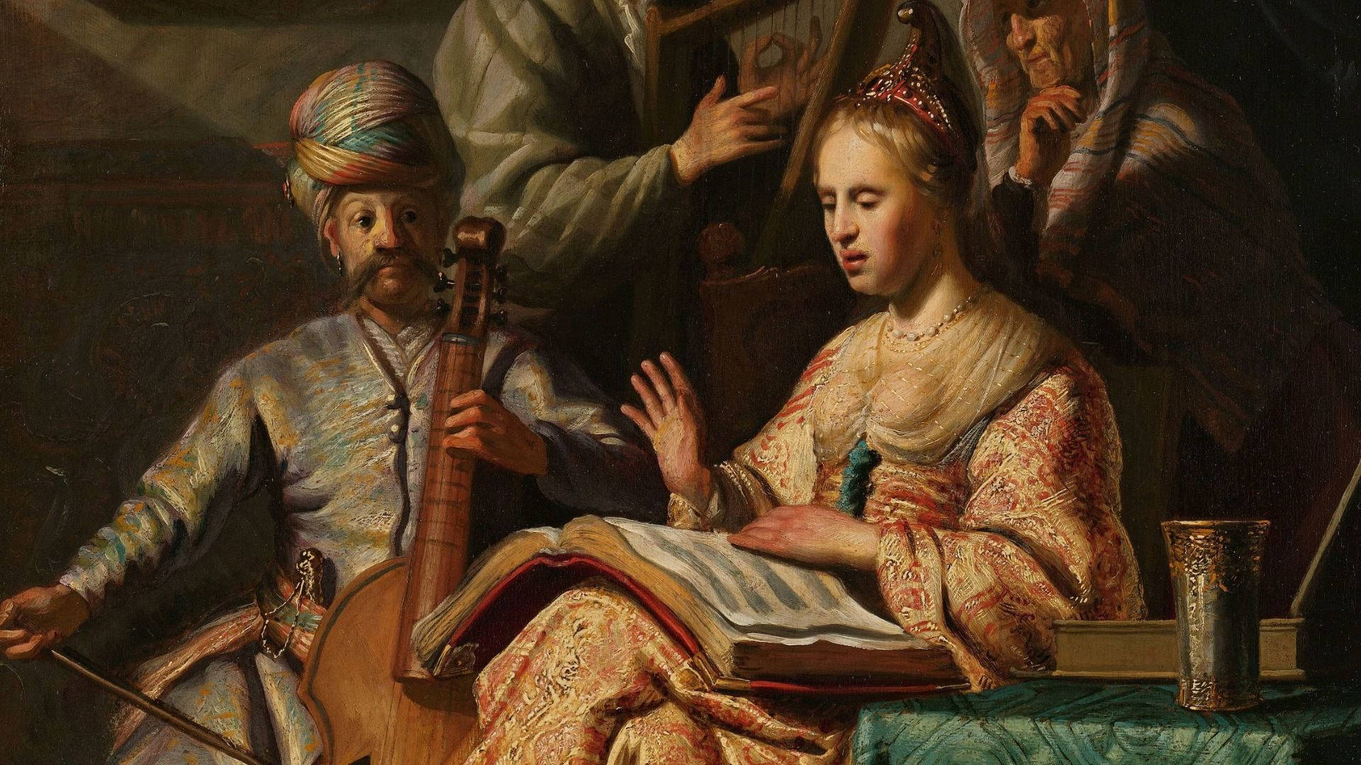 Rembrandt 桌布 壁紙 — 一位身穿華麗長袍的女子正在看書，而一位戴著頭巾的男子在昏暗的房間裡彈奏弦樂器。