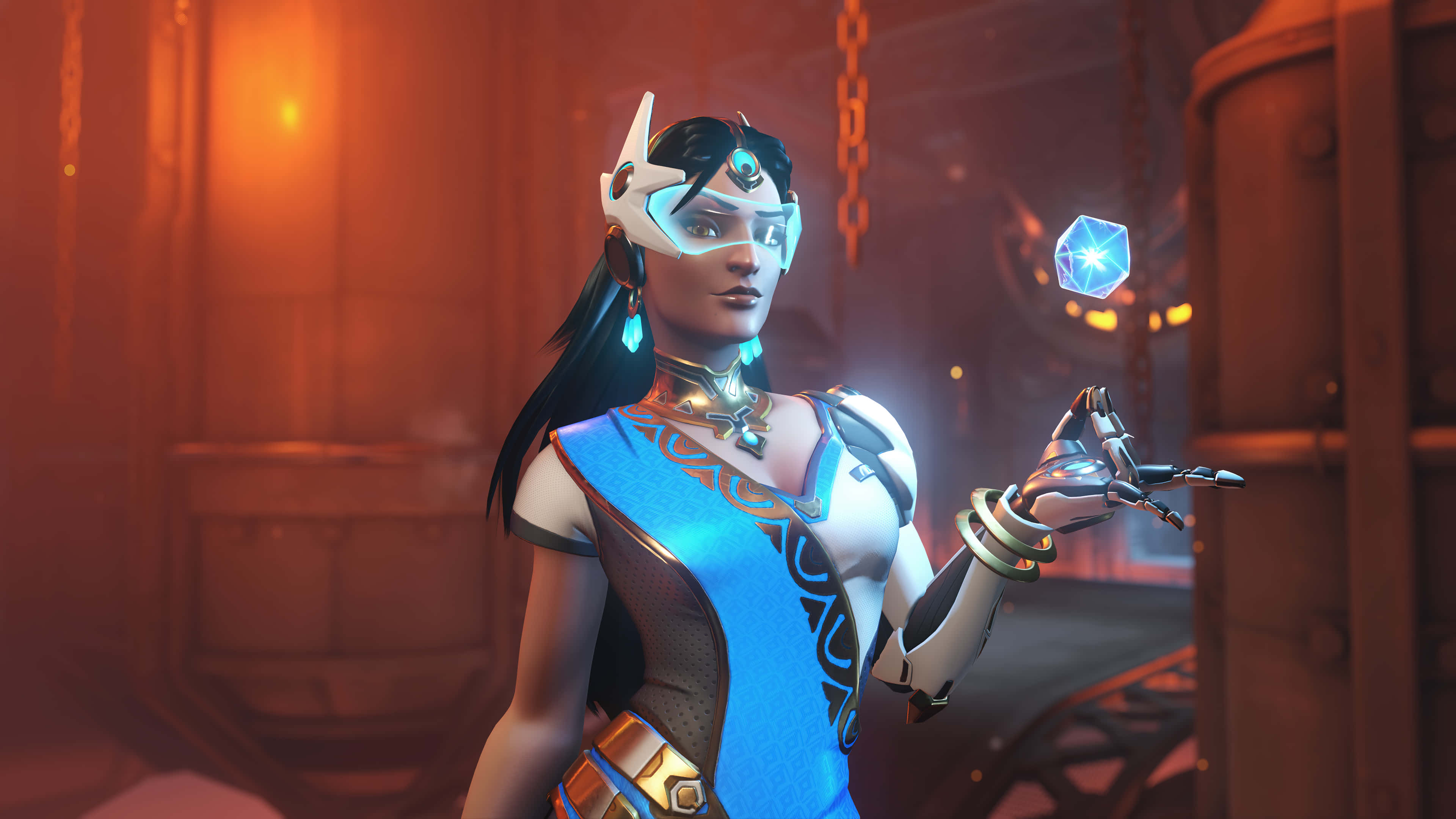Overwatch Heroes 桌布 壁紙 — 一位身穿藍白盔甲的未来女戰士在昏暗的工業房間中手持發光的藍色水晶。