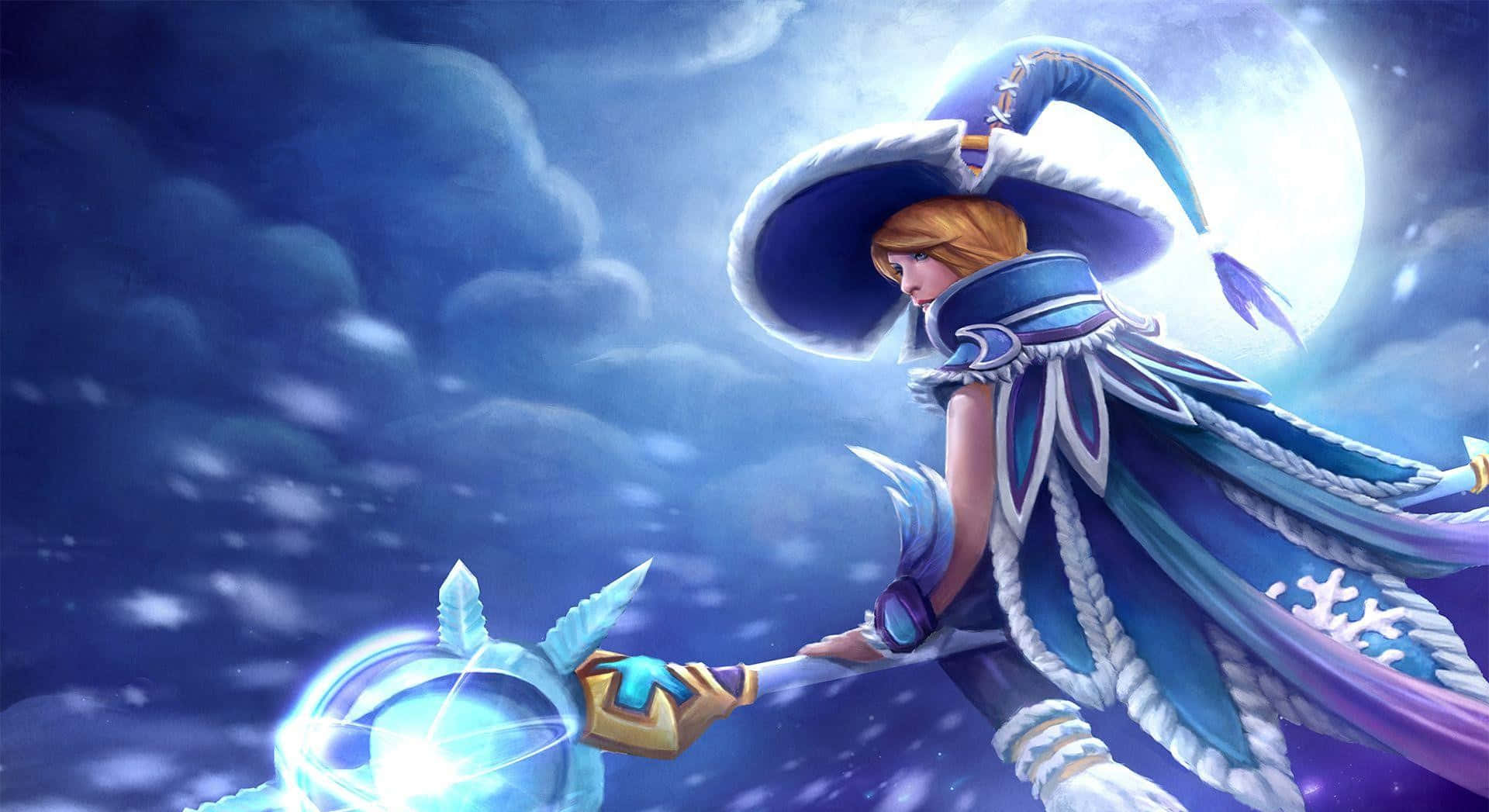 Crystal Maiden 桌布 壁紙 — 一位身穿藍色冬季服裝的奇幻法師，在滿月下的雪夜天空中施展發光的冰魔法。