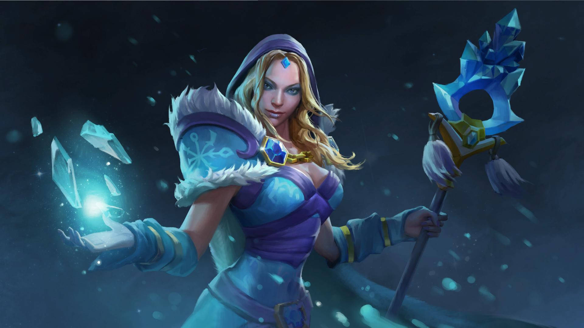 Dota 2 桌布 壁紙 — 一位身穿藍色和紫色盔甲的冰霜法師，在黑暗的雪景背景下，手持水晶法杖，召喚出發光的冰碎片。