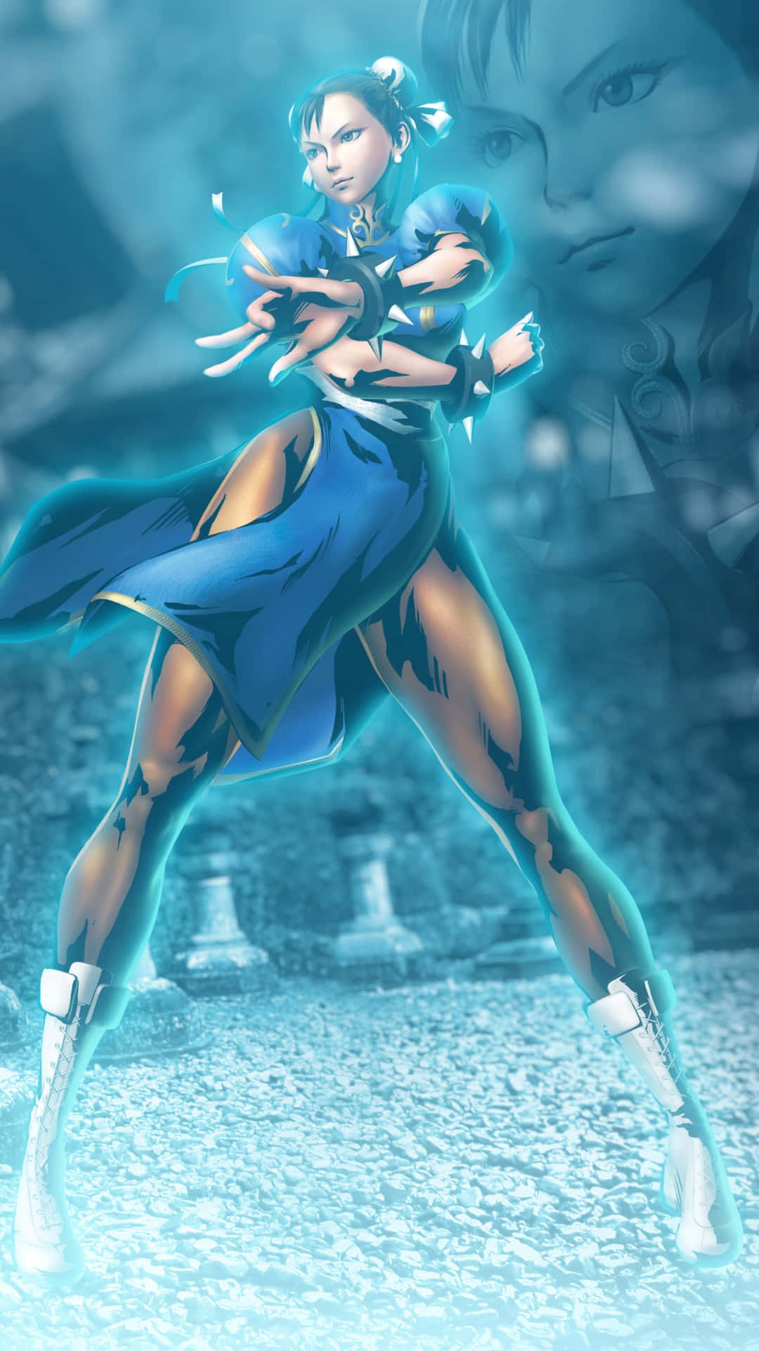 Marvel Vs Capcom Characters 桌布 壁紙 — 一位身穿藍色服裝的武術家，在霧氣繚繞的石頭背景下擺出動態姿勢，伴隨著發光的能量效果。