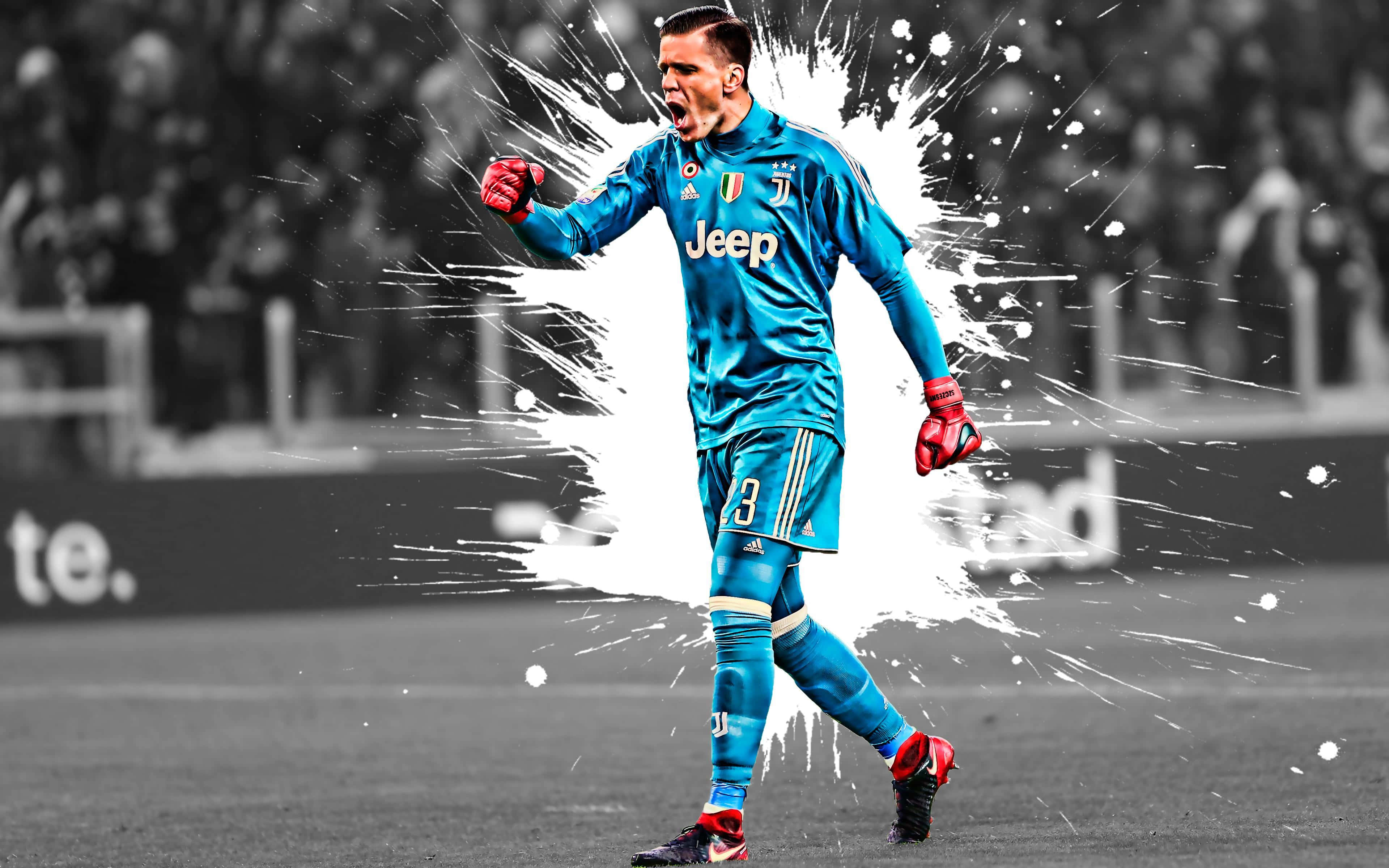 Wojciech Szczesny 桌布 壁紙 — 一位身穿藍色球衣的尤文圖斯門將在黑白球場上勝利咆哮，白色油漆飛濺在他周圍爆炸。
