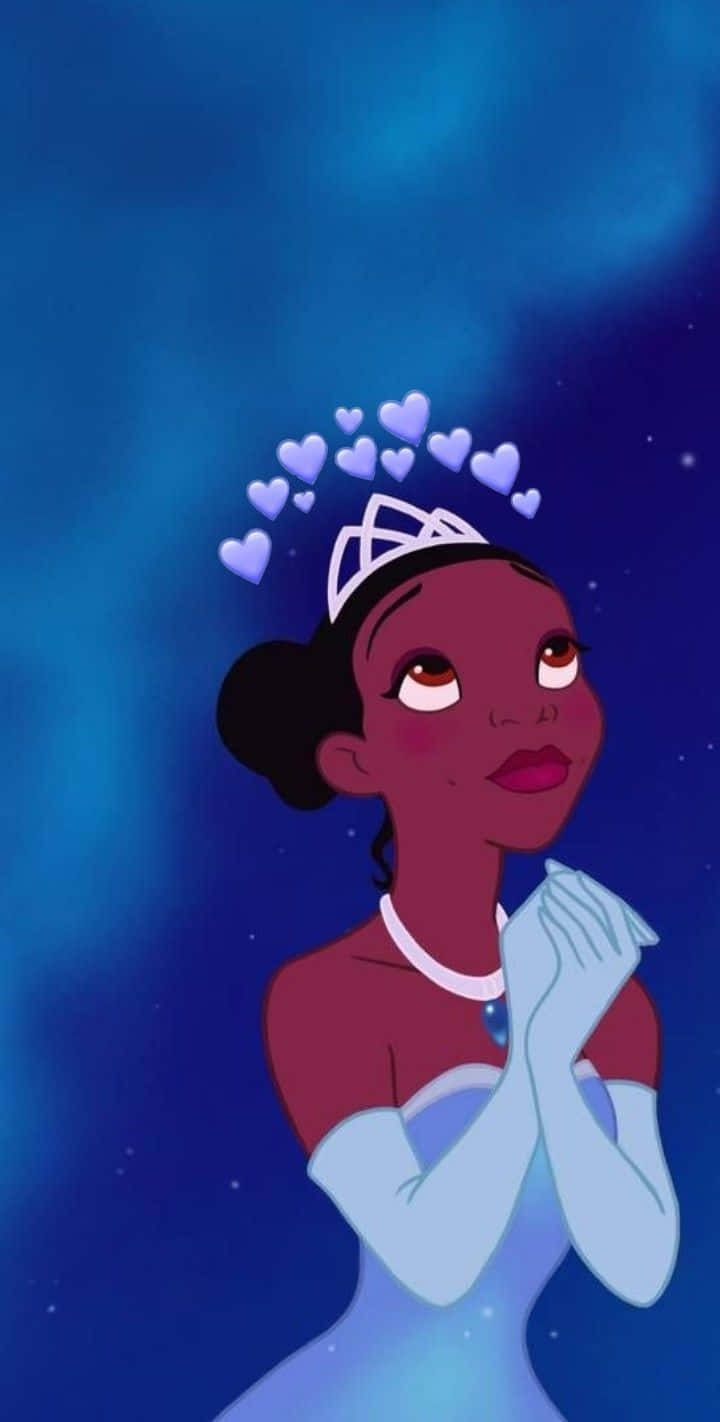 Princess Tiana 桌布 壁紙 — 一位身穿藍色禮服和頭戴皇冠的公主，在繁星點點的夜空下，抬頭仰望，頭頂上漂浮著心形圖案。