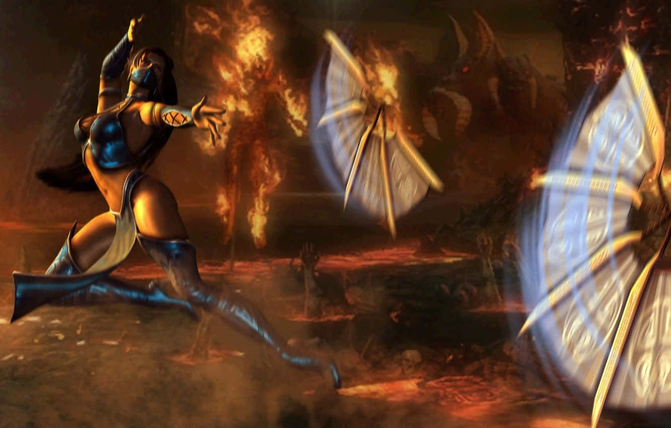Mortal Kombat Kitana 桌布 壁紙 — 一位身穿藍色鎧甲的女戰士在黑暗的競技場中，揮舞著發光的刀刃，穿過熊熊烈火，對抗惡魔敵人。