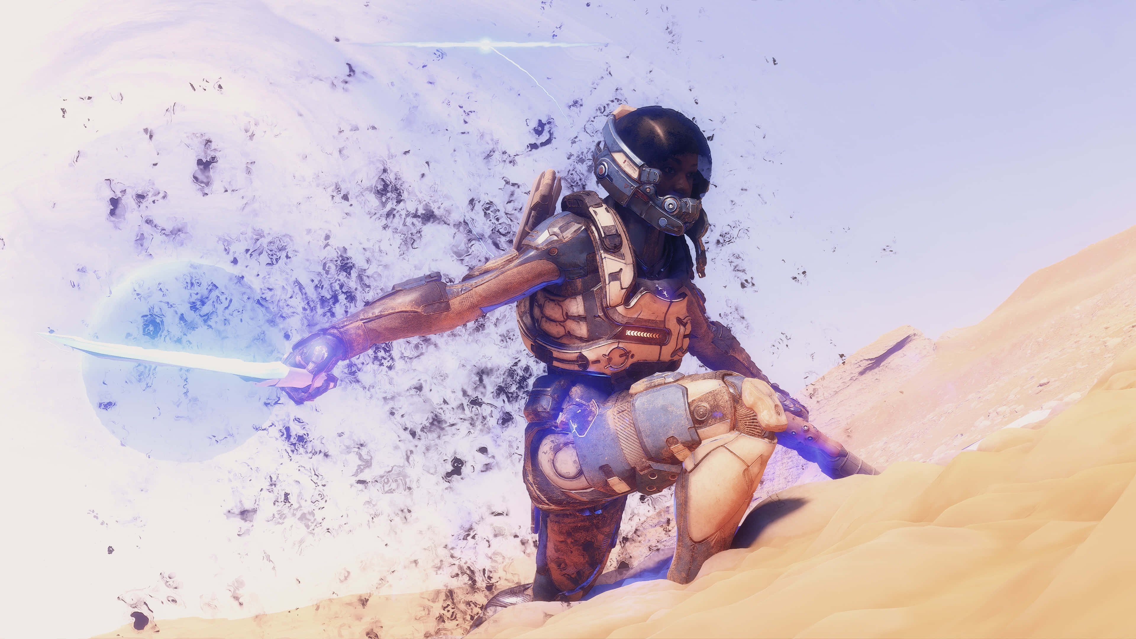 Mass Effect Andromeda 桌布 壁紙 — 一位身穿裝甲裝備的未來戰士在沙漠星球上用發光的劍劈開沙子。