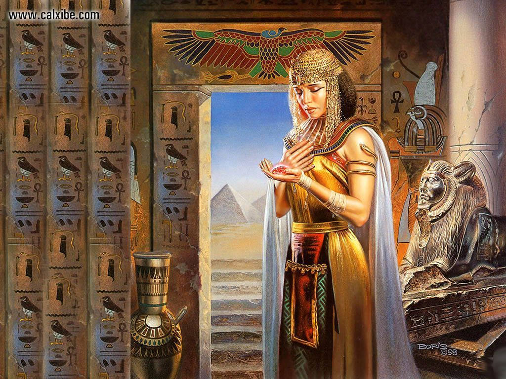 Cleopatra 桌布 壁紙 — 一位身穿金色王袍的埃及女王，在帶有金字塔和象形文字的門前，手持紅色球體祈禱。
