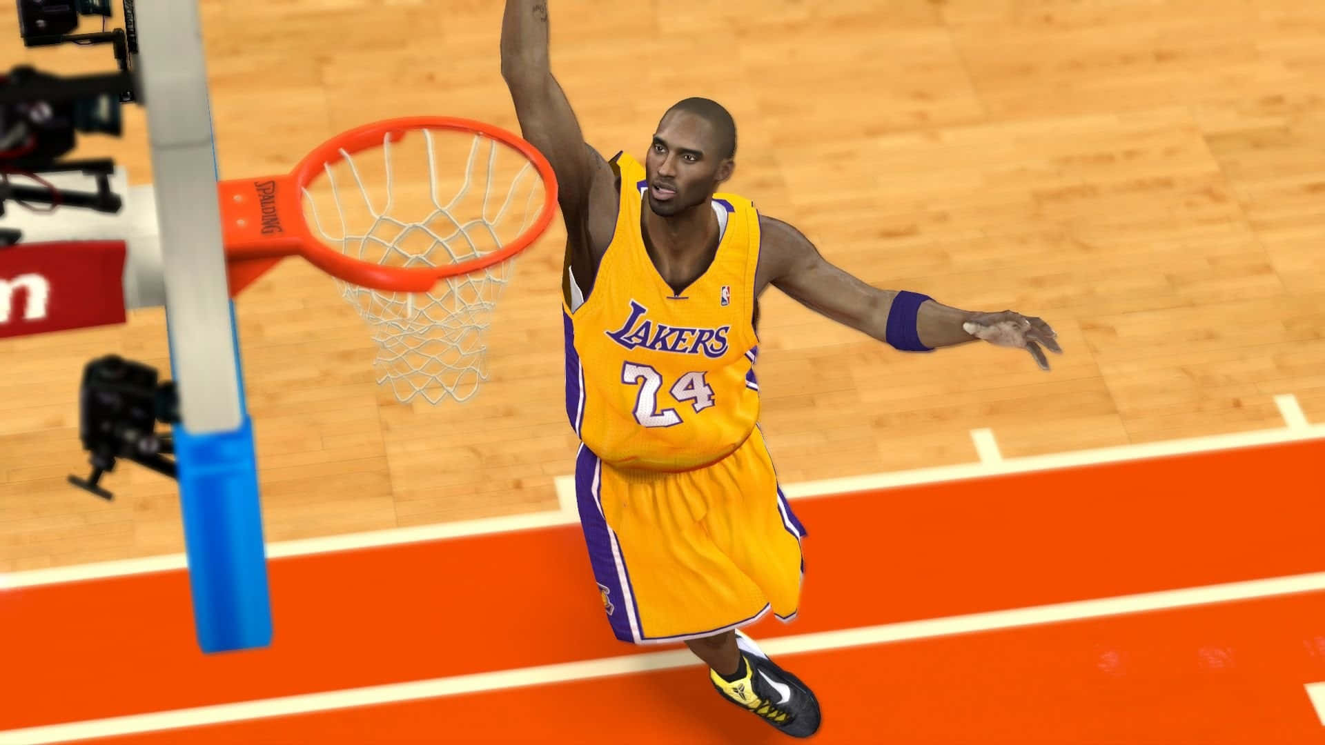 NBA 2k21 桌布 壁紙 — 一位身穿黃色湖人隊球衣的籃球運動員在木地板上單手高舉灌籃，充滿勝利姿態。