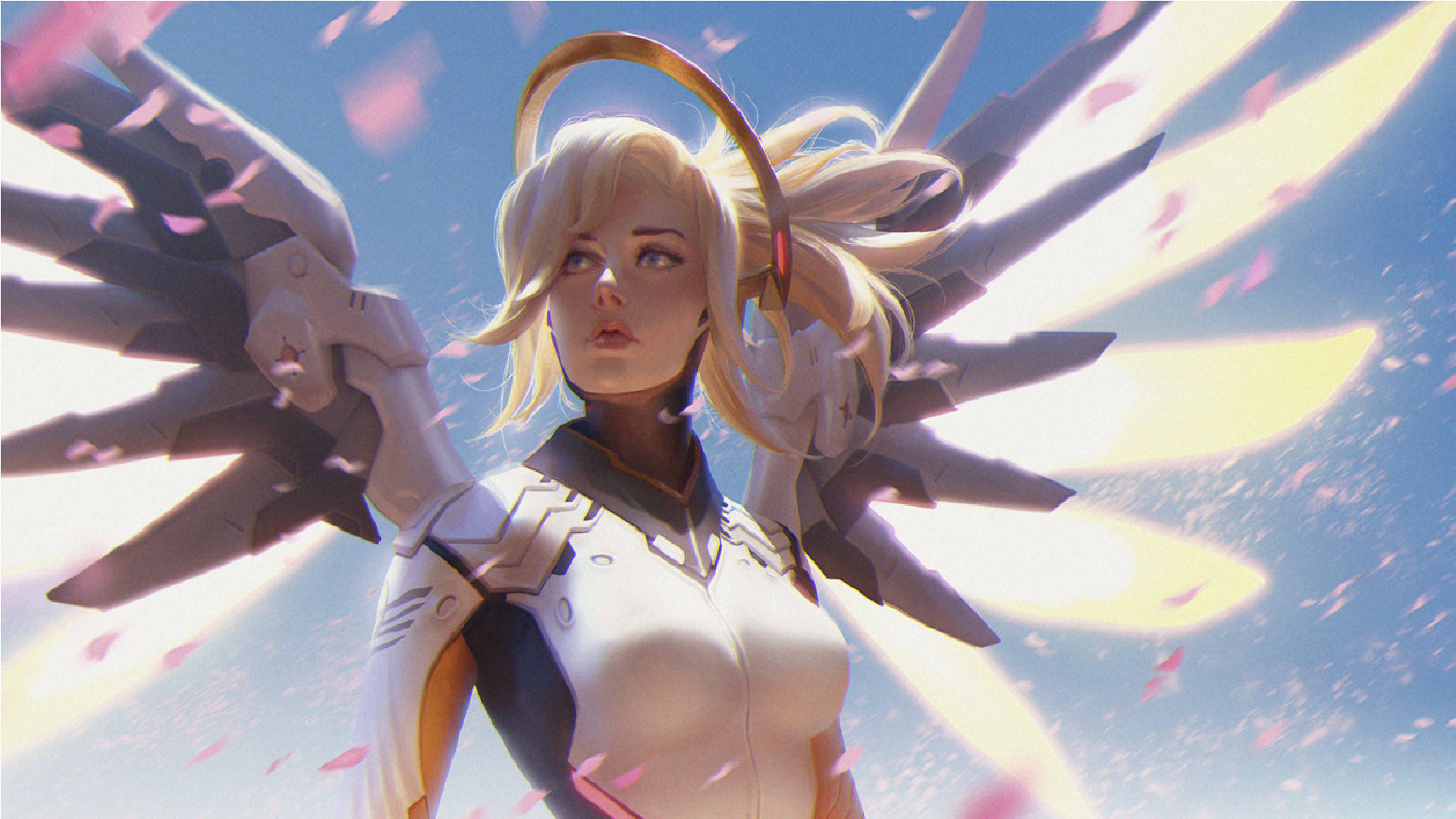 Mercy 桌布 壁紙 — 一位金髮動漫天使，擁有機械翅膀和光環，站在明亮的藍天下，粉紅色花瓣在她周圍飄浮。