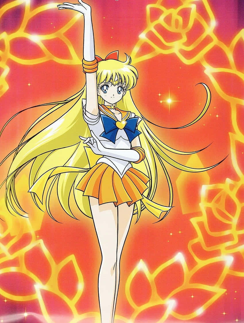 Sailor Venus 桌布 壁紙 — 一位金髮動漫少女穿著水手服，在熾熱的橙色背景上優雅地擺姿勢，背景有發光的花卉圖案。