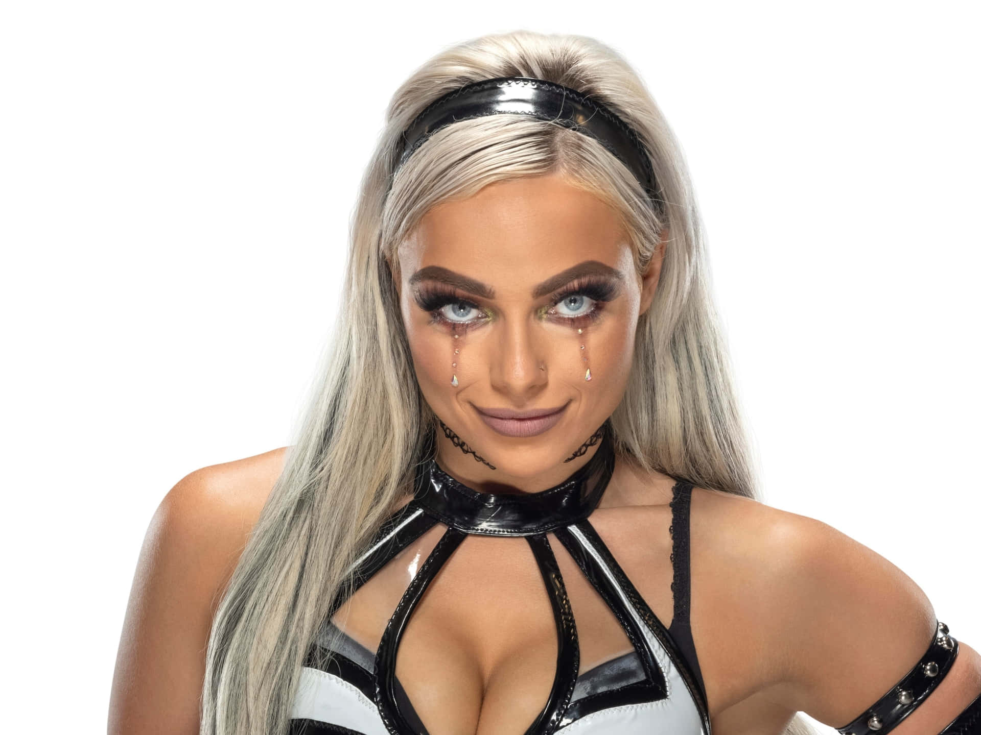 WWE 桌布 壁紙 — 一位金髮女子穿著黑白乳膠服裝，淚水從臉上流下，背景為白色。