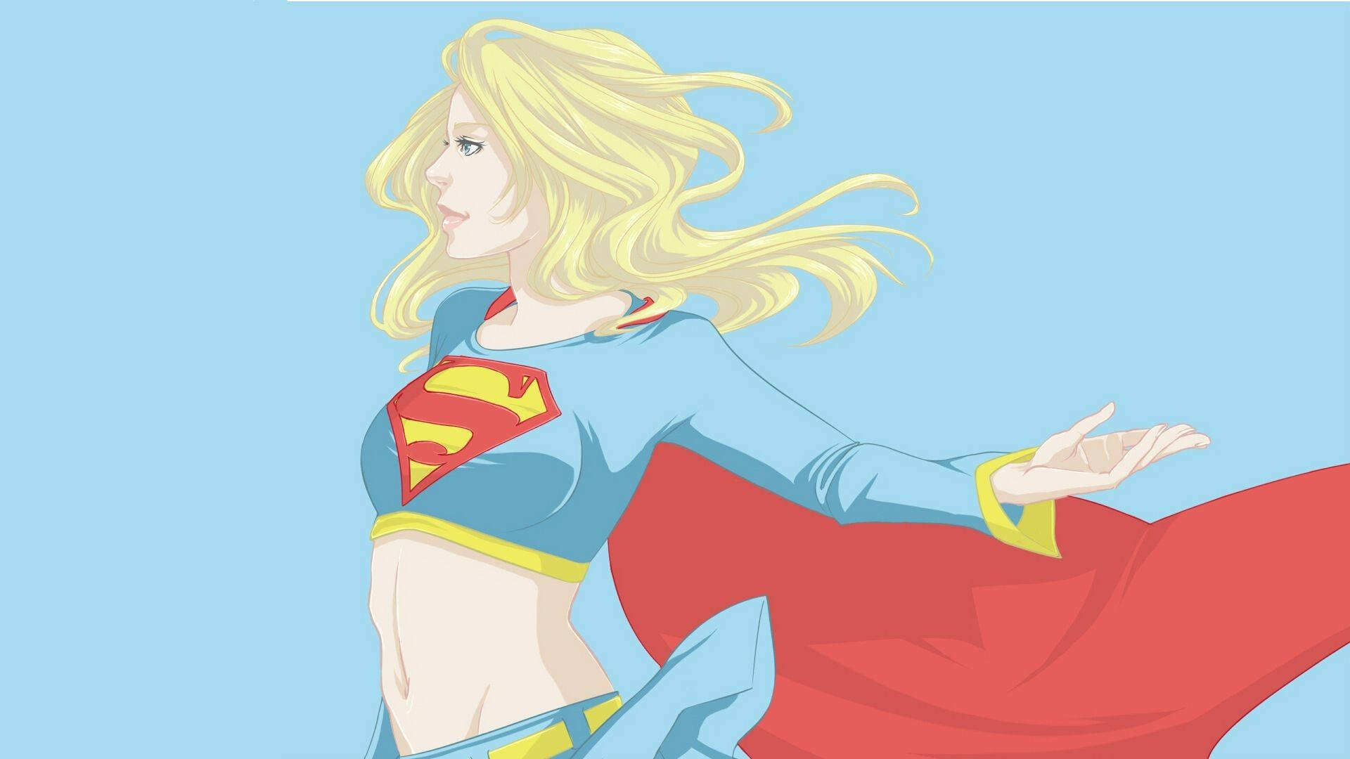 Superwoman 桌布 壁紙 — 一位金髮女超級英雄，身穿藍紅配色服裝，披著飄逸的斗篷，自信地站在純淺藍色背景前。