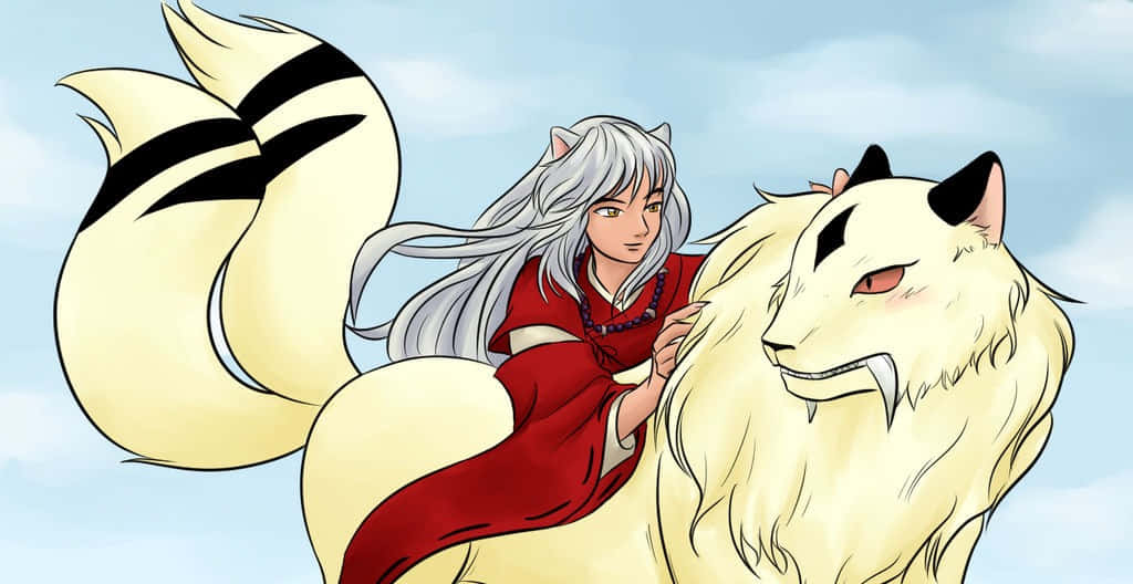 Inuyasha And Kirara 桌布 壁紙 — 一位銀髮動漫角色身穿紅色長袍，騎著一隻帶有黑色斑紋的大型奶油色狐狸，背景是柔和的藍天。