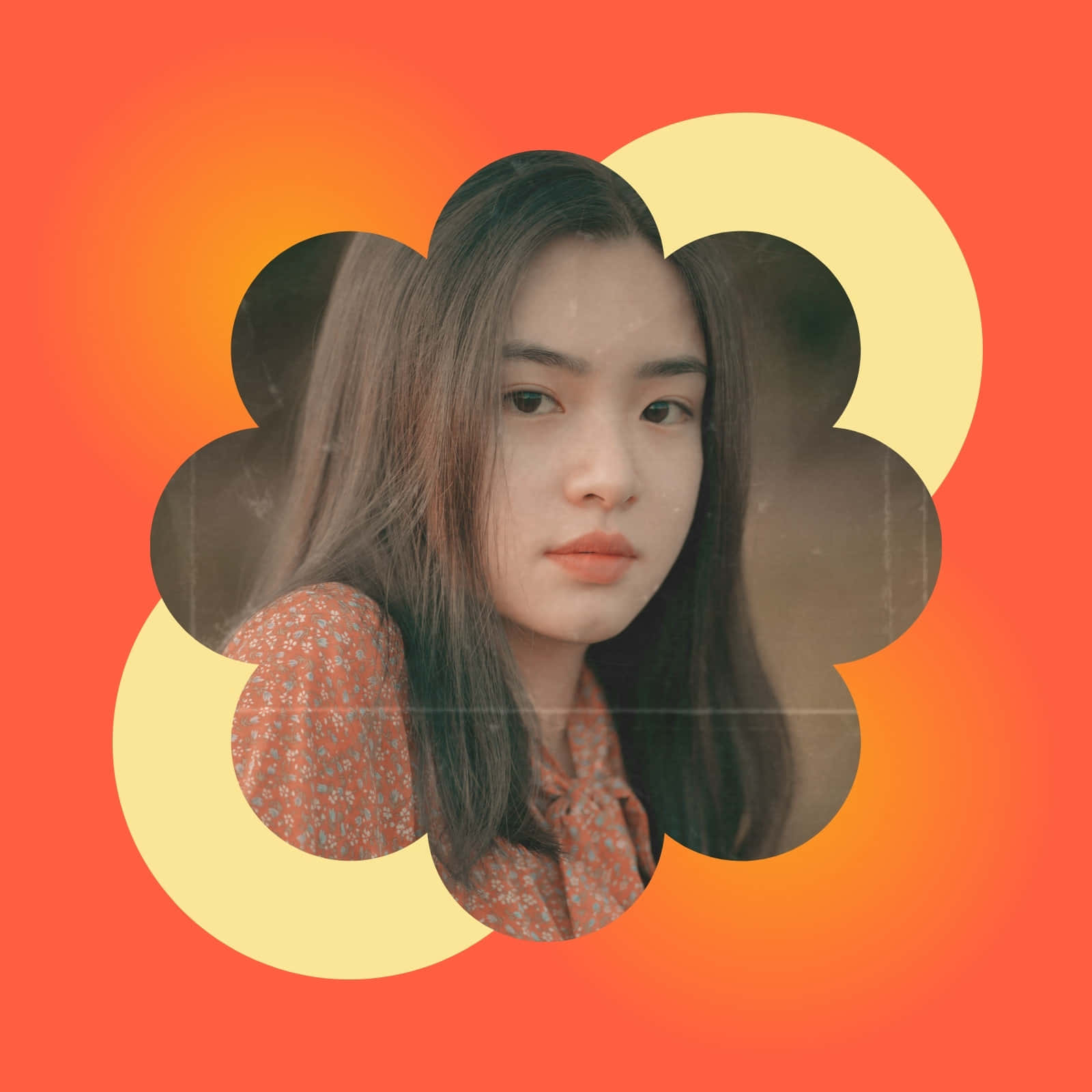Frame 桌布 壁紙 — 一位長黑髮的年輕女性透過花朵形狀的鏤空，在溫暖的橙色漸變背景上柔和地凝視。