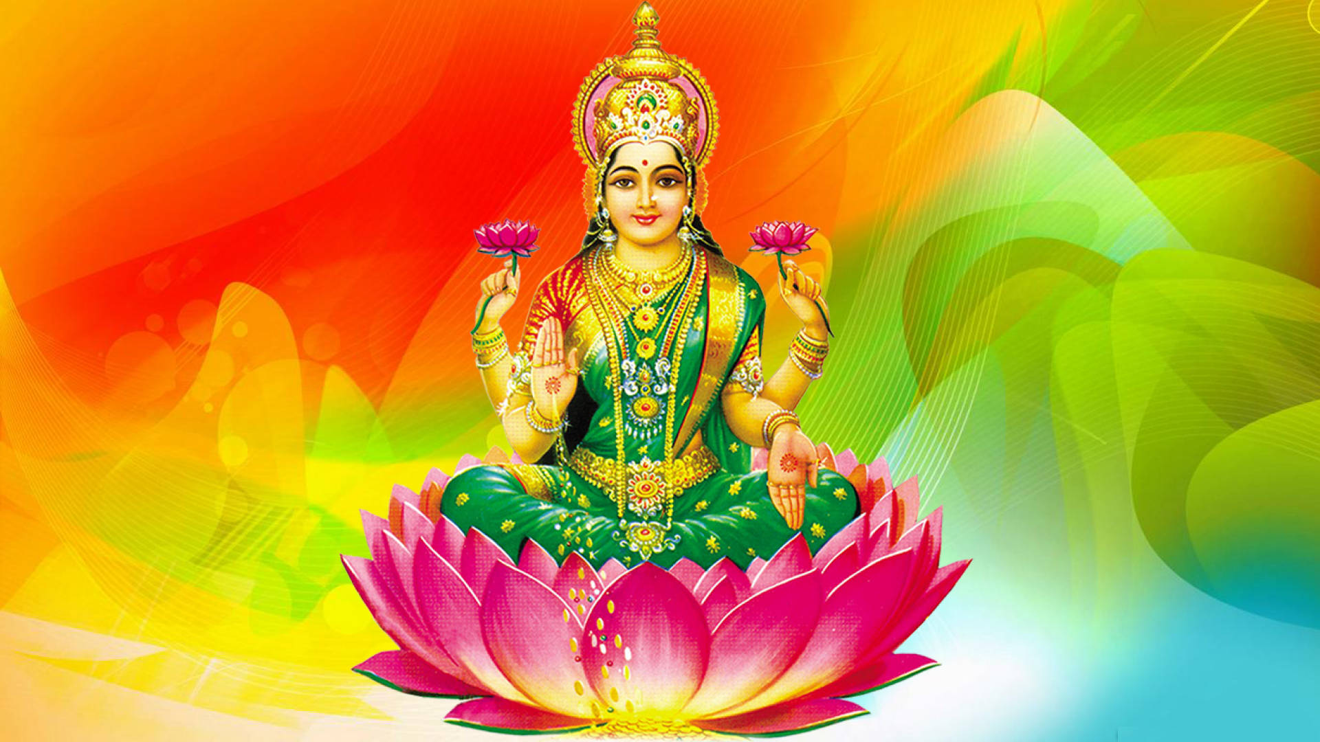 Lakshmi Devi 桌布 壁紙 — 一位閃耀的女神，身披綠色與金色，優雅地坐在一朵鮮豔的粉紅色蓮花上，背景是旋轉的彩虹漸層。