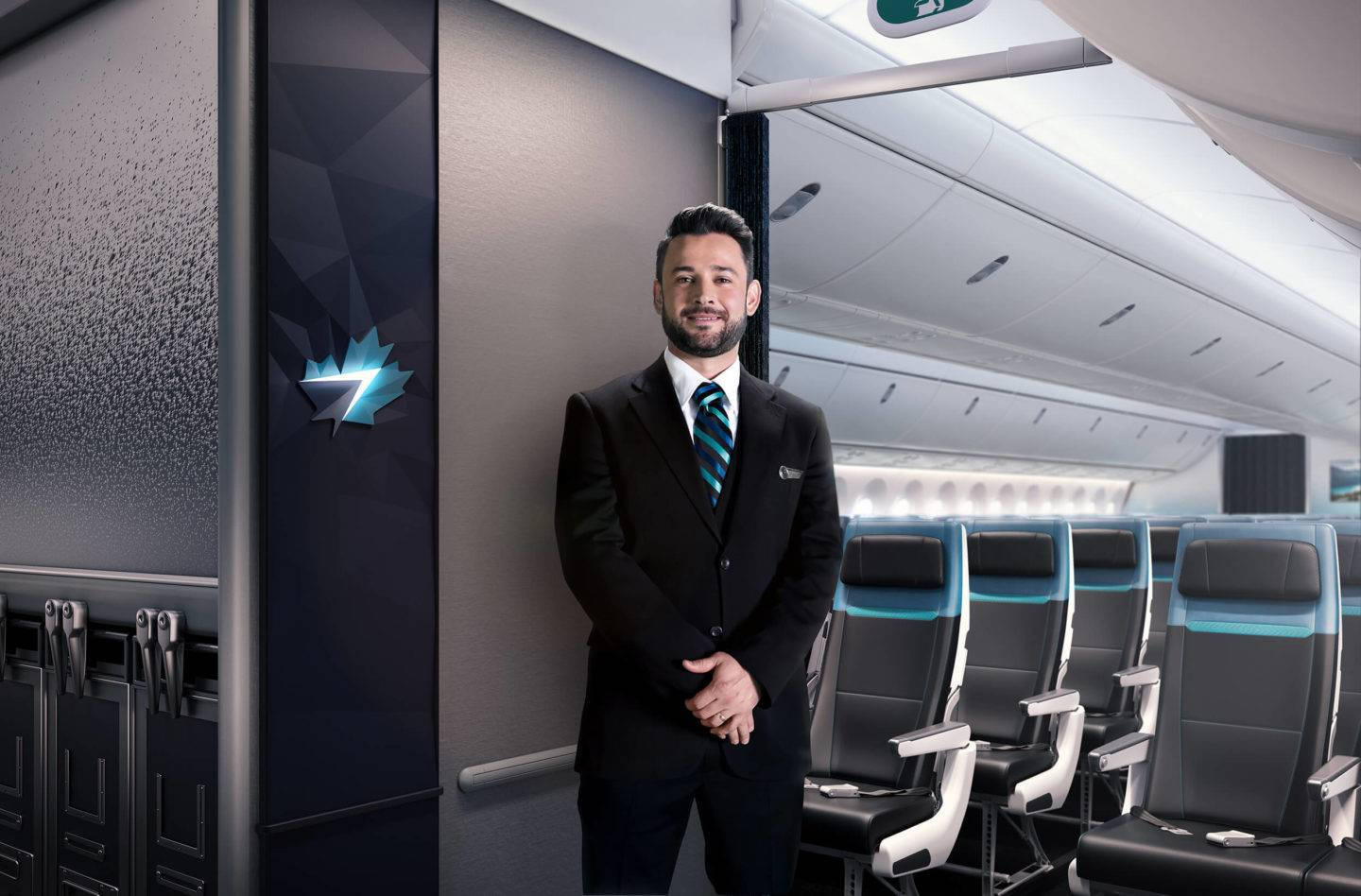Aviation 桌布 壁紙 — 一位面帶微笑的男空服員穿著俐落西裝，自信地站在現代化的飛機客艙中，客艙內有光滑的黑色座椅和藍色燈光裝飾。