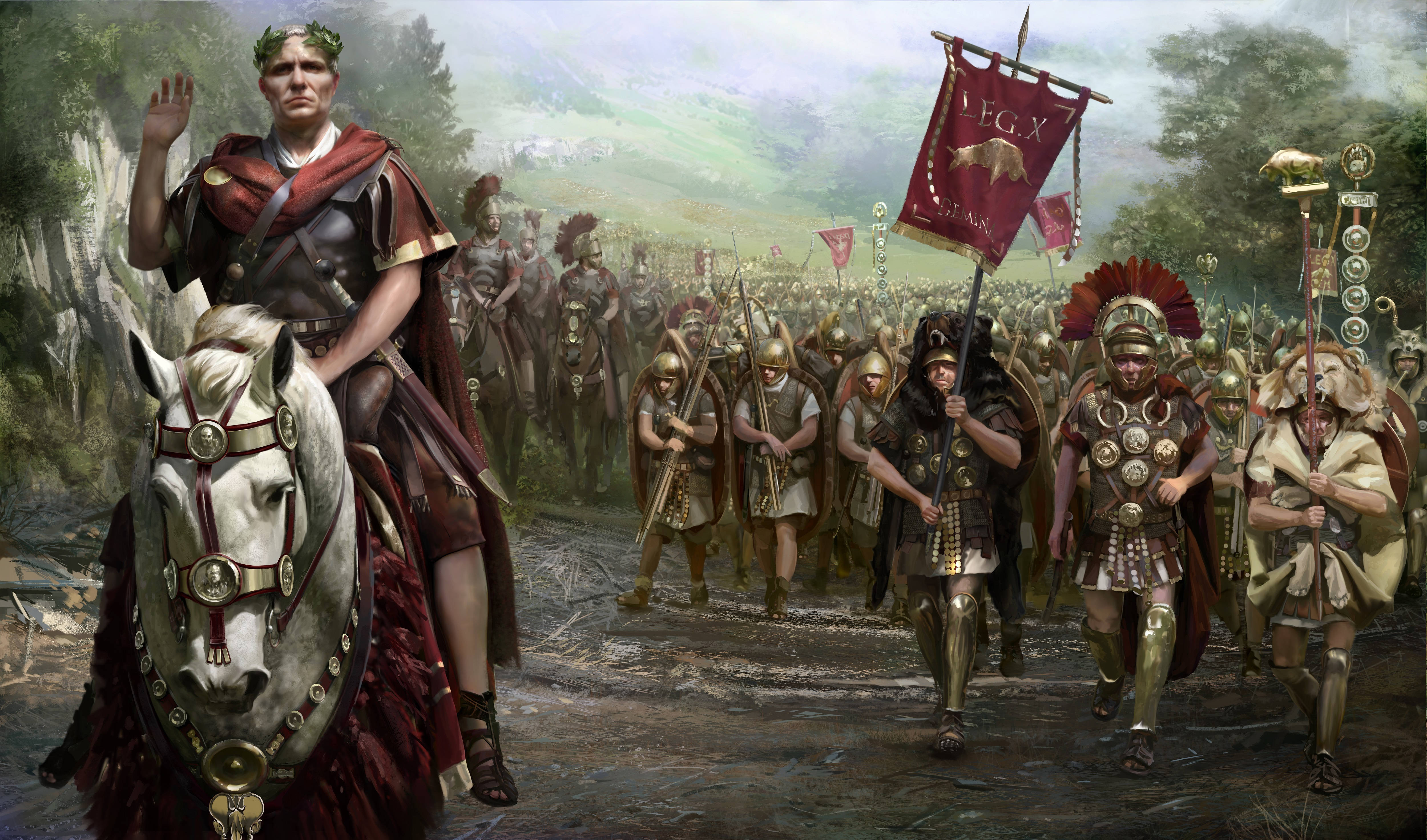 Total War Rome 2 桌布 壁紙 — 一位騎著白馬的羅馬將軍帶領他的軍團穿過森林山谷，士兵們列隊行進。