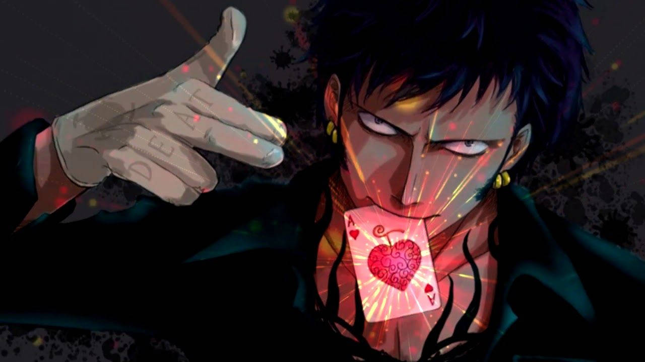 海賊王 桌布 壁紙 — 一位黑髮動漫男子，眼睛發光，戴著手套的手做出「交易」手勢，同時拿著一張發光的心形卡牌。
