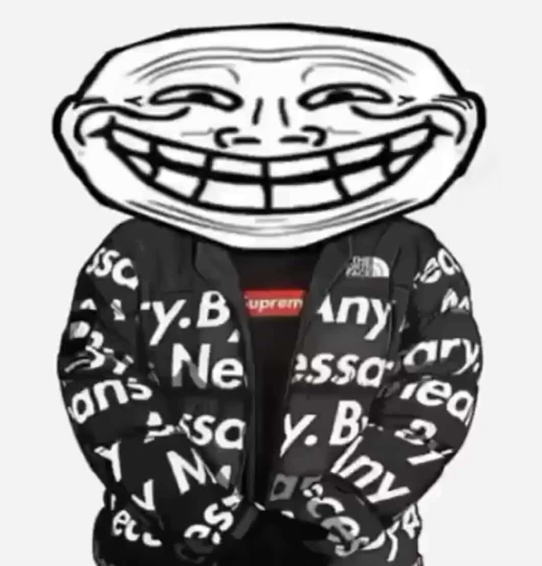 supreme 桌布 壁紙 — 一個 troll 臉角色穿著黑色羽絨外套，上面覆蓋白色 'Necessity' 文字和紅色 Supreme 標誌 T 恤。