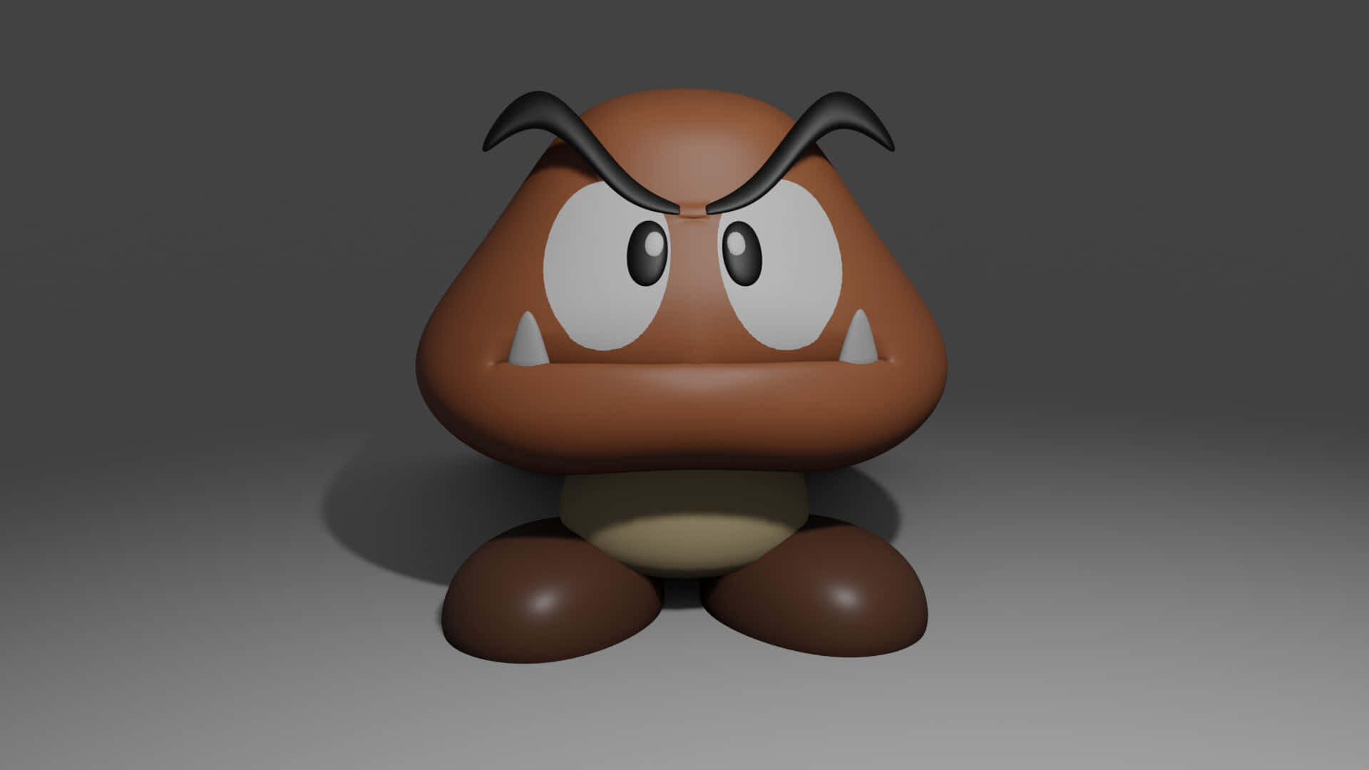 Goomba 桌布 壁紙 — 一個3D渲染的Goomba角色，有棕色蘑菇身體、黑色眉毛和白色眼睛，站在灰色工作室背景前。