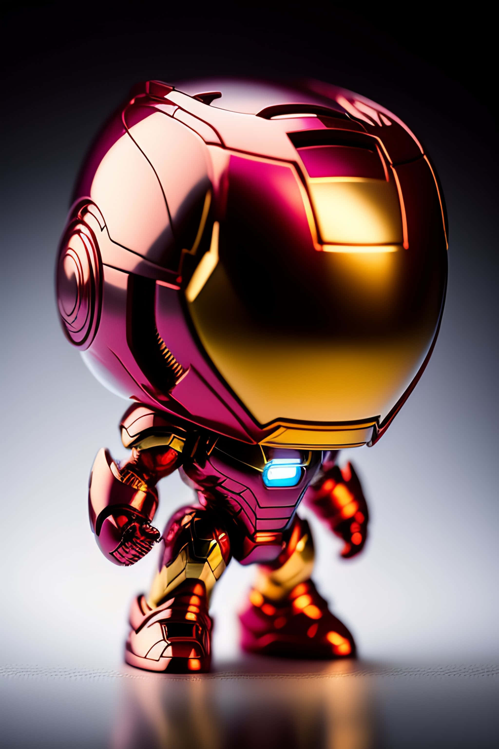 Iron Man Pop Figures 桌布 壁紙 — 一個Q版風格的鋼鐵人人偶，胸前發出藍光，在漸變背景前擺出姿勢。