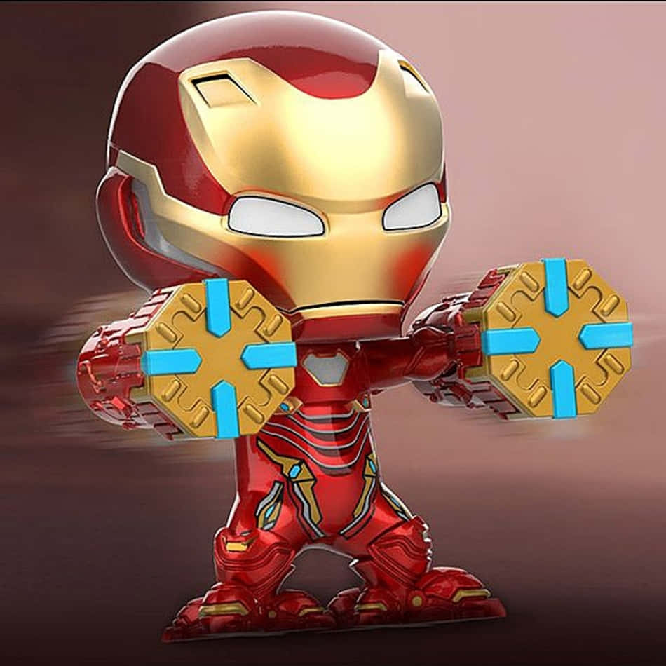 Iron Man Bobbleheads 桌布 壁紙 — 一個Q版風格的鋼鐵人人偶，身穿紅金色裝甲，在漸變背景前伸出發光的藍色斥力炮。