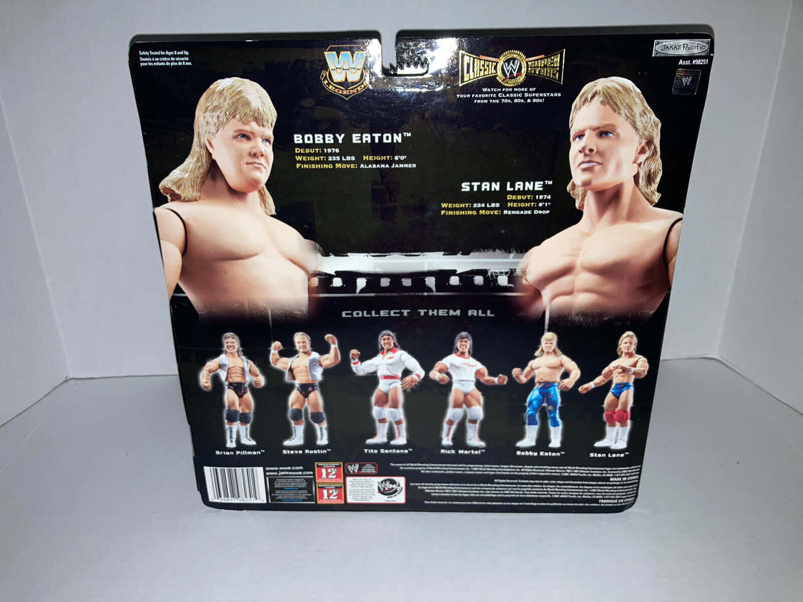 桌布 壁紙 — 一個WWE摔角動作人偶盒， featuring Bobby Eaton 和 Stan Lane，下方展示另外六位經典摔角手。