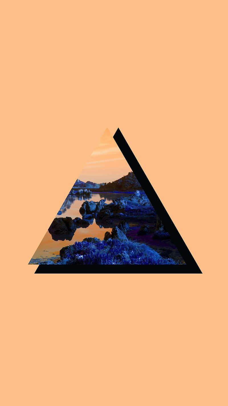 Minimalist Retro 桌布 壁紙 — 一個三角形框架捕捉了暮色湖邊的場景，有發光的藍色岩石和橙色天空，背景為桃色。