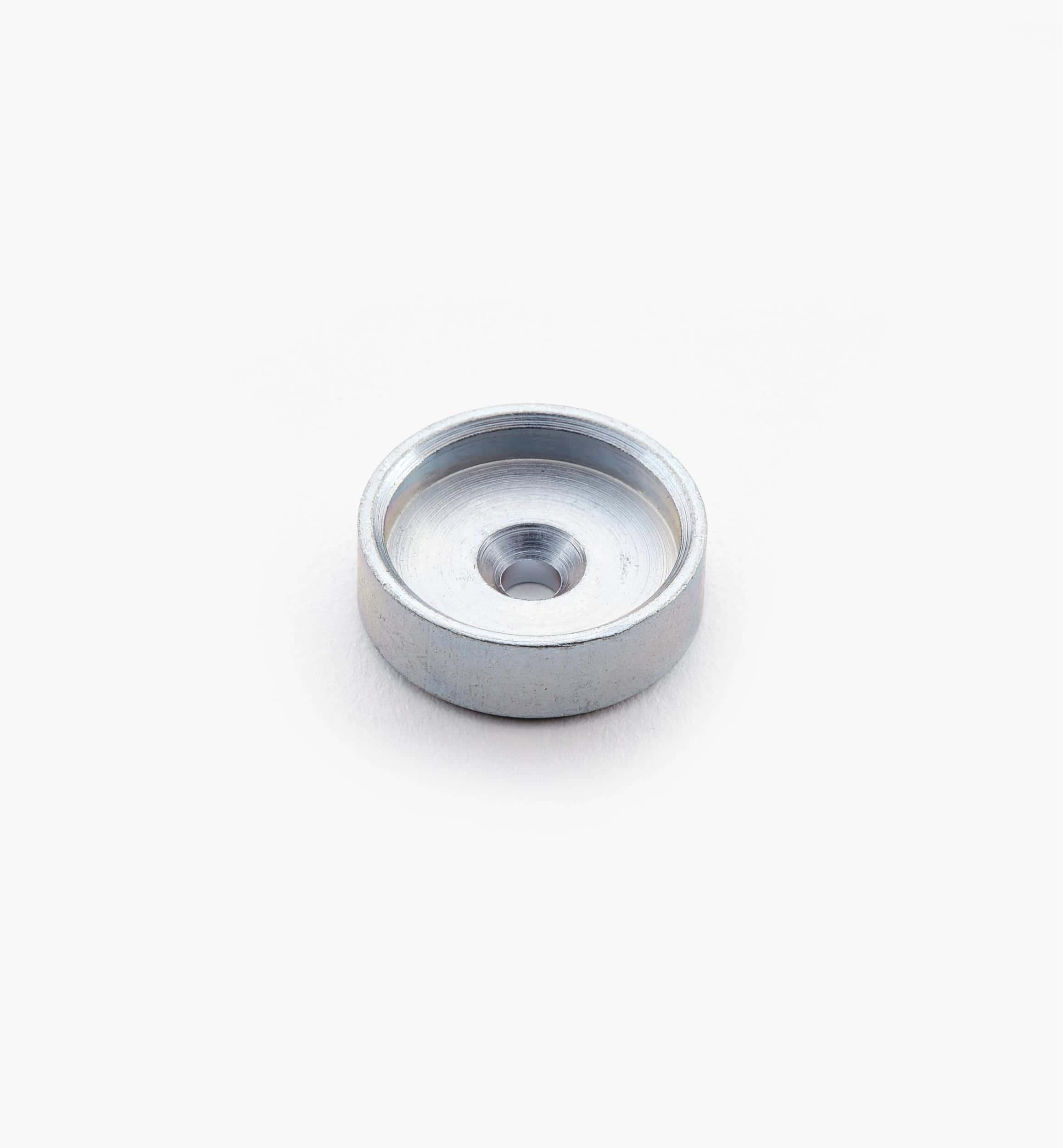 Material 桌布 壁紙 — 一個中央帶有螺紋孔的小型銀色金屬墊圈，居中放置在純白色背景上。