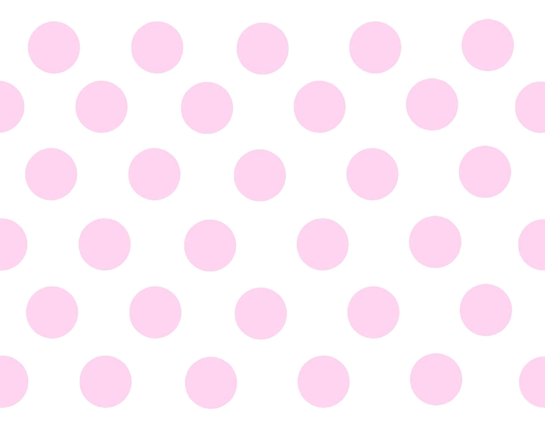 Pink And White Polka Dot 桌布 壁紙 — 一個乾淨的圖案，柔和的粉紅色圓點均勻分佈在白色背景上。