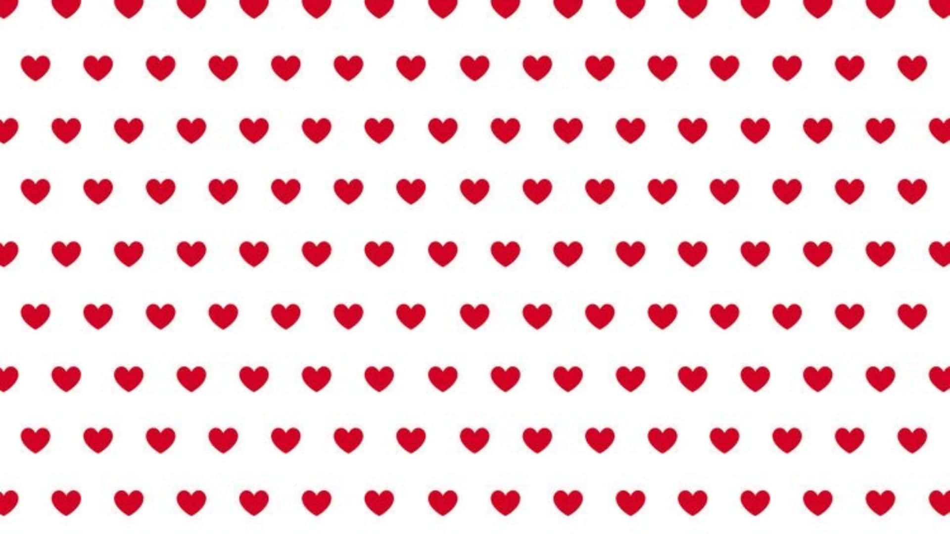 Red Hearts 桌布 壁紙 — 一個乾淨的白色背景，充滿了均勻間隔的紅色心形，形成重複的網格圖案。