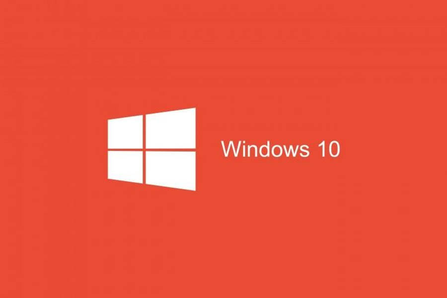 Windows 10 桌布 壁紙 — 一個乾淨簡約的紅色背景，白色Windows 10標誌和文字突出地居中顯示。