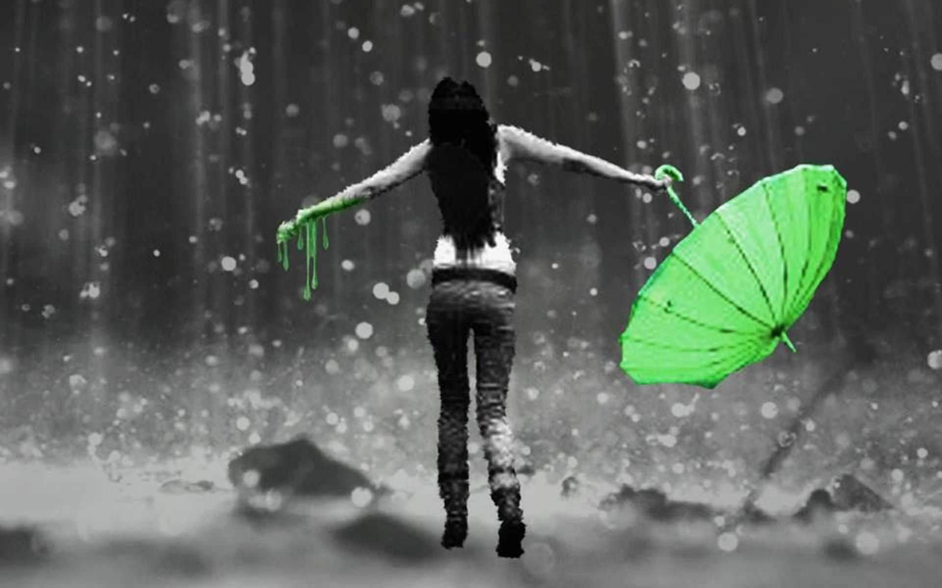 下雨 桌布 壁紙 — 一個人張開雙臂，在單色暴雨中舉起一把鮮綠色的傘。