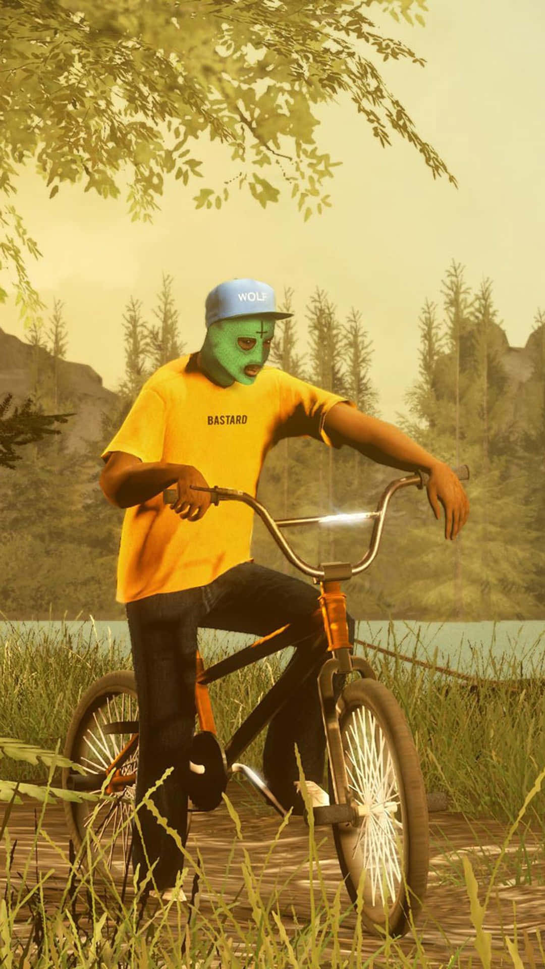 bike riding 桌布 壁紙 — 一個人戴著綠色口罩、穿著黃色襯衫，騎著BMX自行車穿過湖邊的高草叢，背景有松樹。