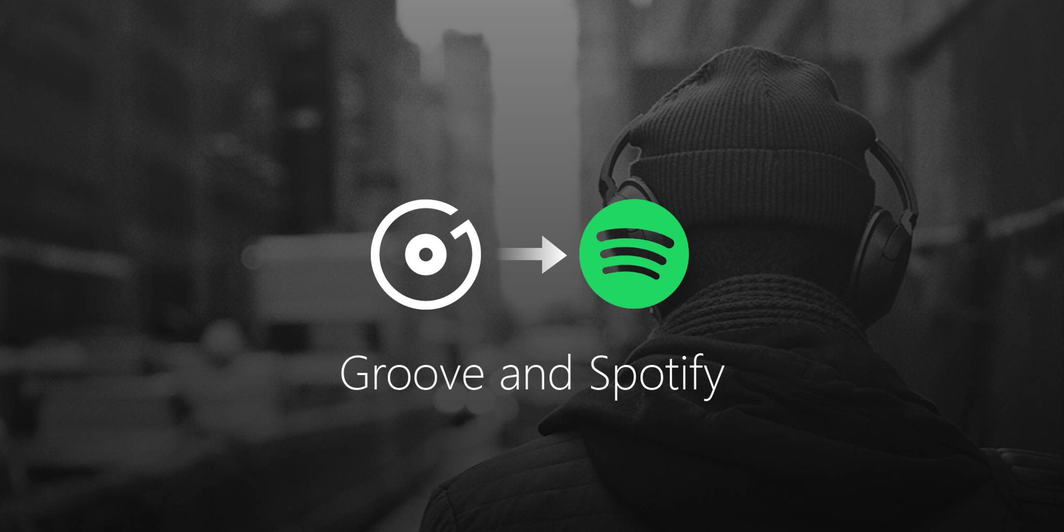 Spotify 桌布 壁紙 — 一個人戴著耳機沿著城市街道走開，同時出現從 Groove 到 Spotify 的標誌過渡。