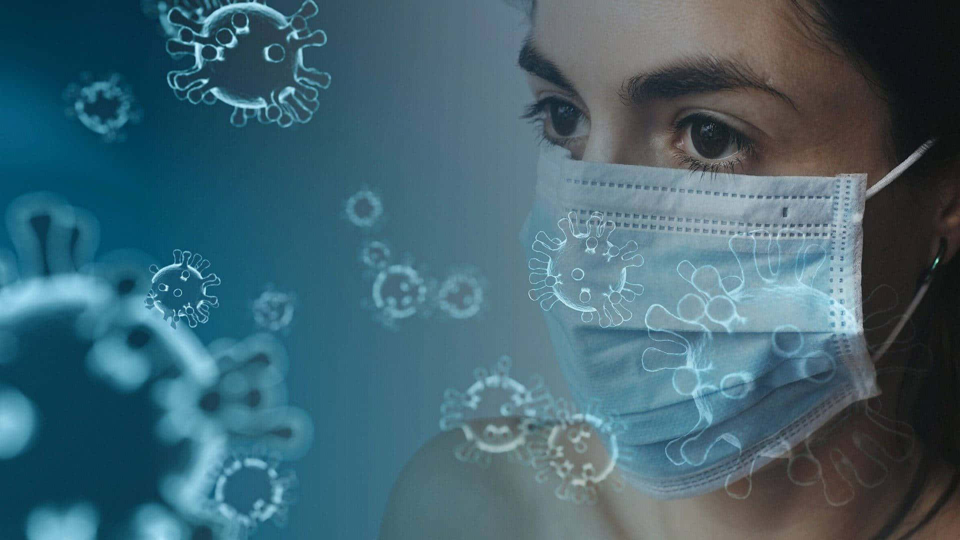 Covid 桌布 壁紙 — 一個人戴著醫用口罩，半透明的病毒顆粒在他們周圍漂浮，背景是冷藍色。