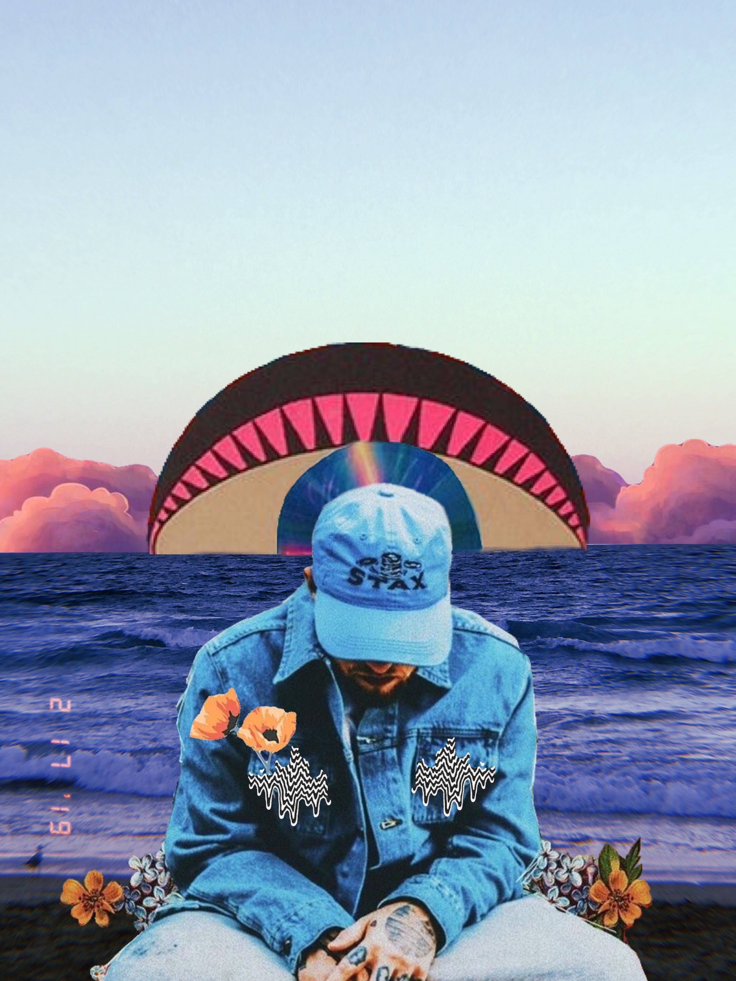 mac miller 4K 桌布 壁紙 — 一個人穿著牛仔外套坐在沙灘上，一個巨大的粉紅色和黑色降落傘在他們身後形成一個嘴巴，背景是粉彩色的天空。