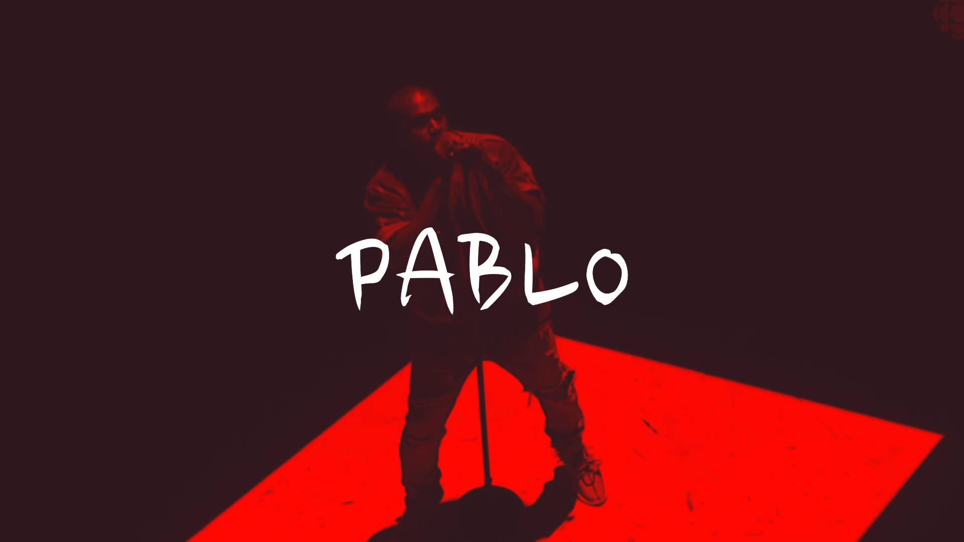 Kanye 桌布 壁紙 — 一個人站在紅色舞台的聚光燈下，背景深色，白色文字顯示PABLO。