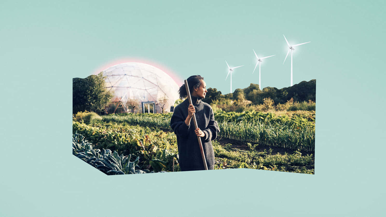 Wind 桌布 壁紙 — 一個人站在茂盛的花園中，手持鋤頭，背景可見測地線穹頂和風力渦輪機，天空柔和。