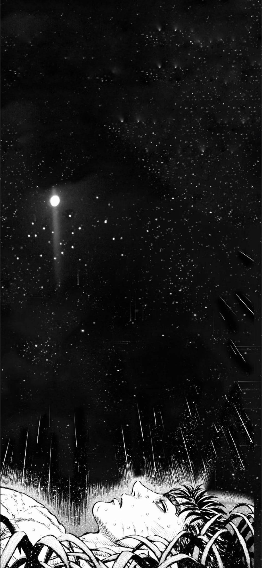 黑白 桌布 壁紙 — 一個人躺在草地上，仰望繁星點點的夜空，一顆明亮的彗星劃過天際。