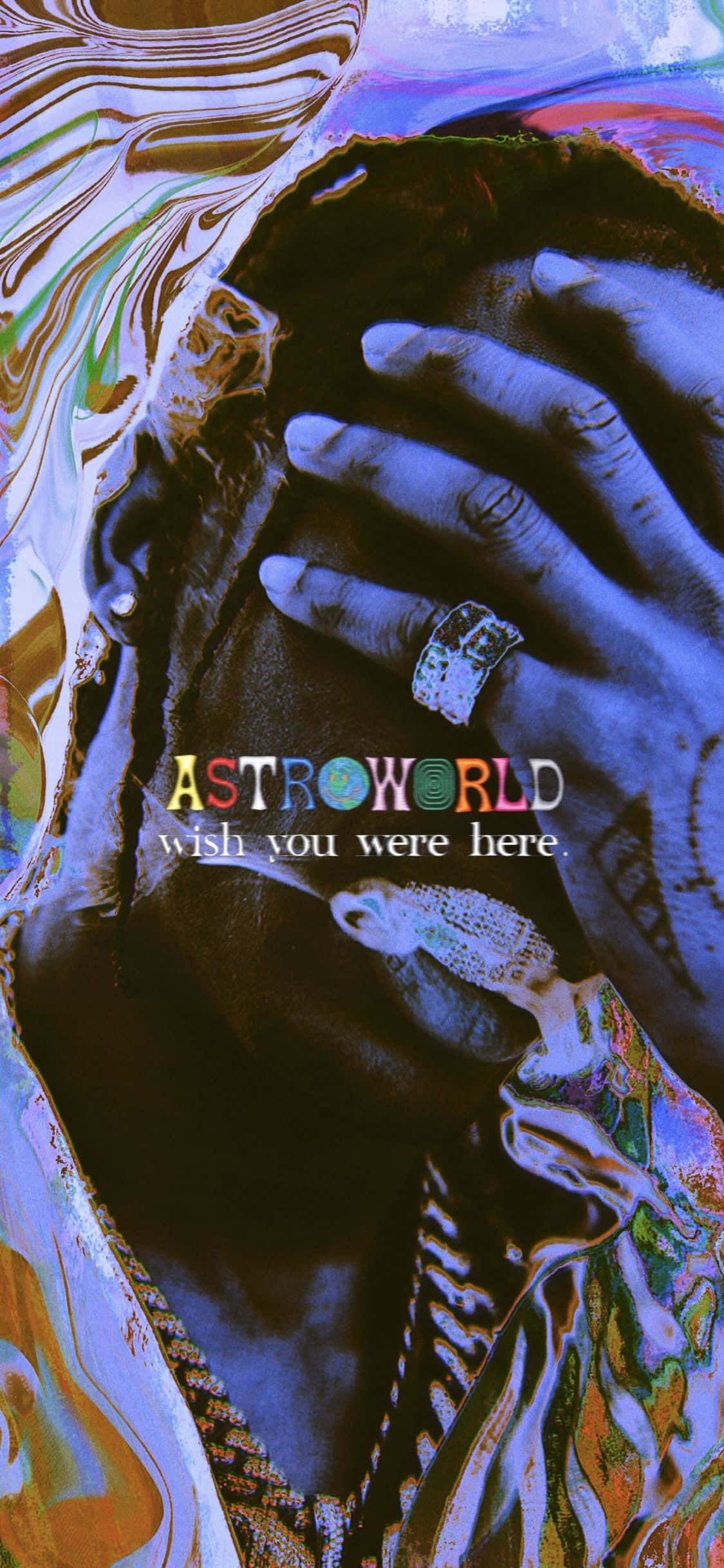 Astroworld 桌布 壁紙 — 一個人雙手掩面，置身於藍色、金色和紫色的迷幻漩渦中，並帶有「ASTROWORLD」文字。