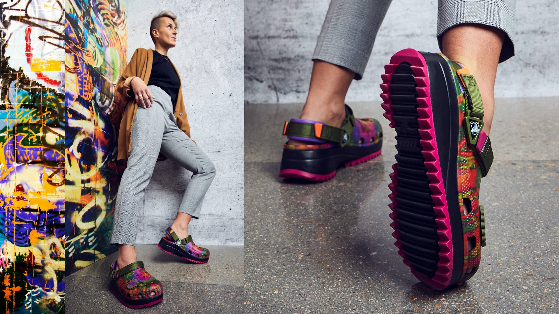 Crocs 桌布 壁紙 — 一個人靠著充滿活力的塗鴉牆，展示色彩繽紛的厚底木屐，搭配大膽的粉紅色鞋底。