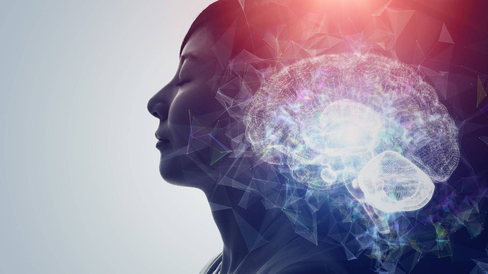 mind 桌布 壁紙 — 一個人頭的剪影，旁邊漂浮著一個發光的幾何大腦，背景是柔和的漸變色。